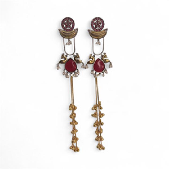Elegant handcrafted earrings with red stones